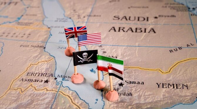 Illustration représentant les rebelles Houthis au Yémen dans le contexte du conflit, symbolisant le débat sur leur statut et leur rôle politique.