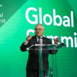 Mark Moseley intervenant à Berlin lors du Sommet mondial des investisseurs en infrastructures, devant un public international de décideurs financiers.