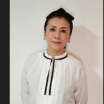 Photo de Yuria Ito, conseillère en nutrition dentaire préventive, qui promeut une approche globale de la santé bucco‑dentaire dès avant la naissance.